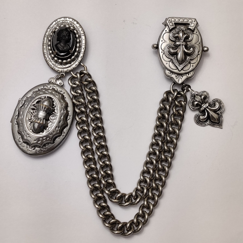 Vintage Silver Brooch with Chain and Fleur-de-Lis Design